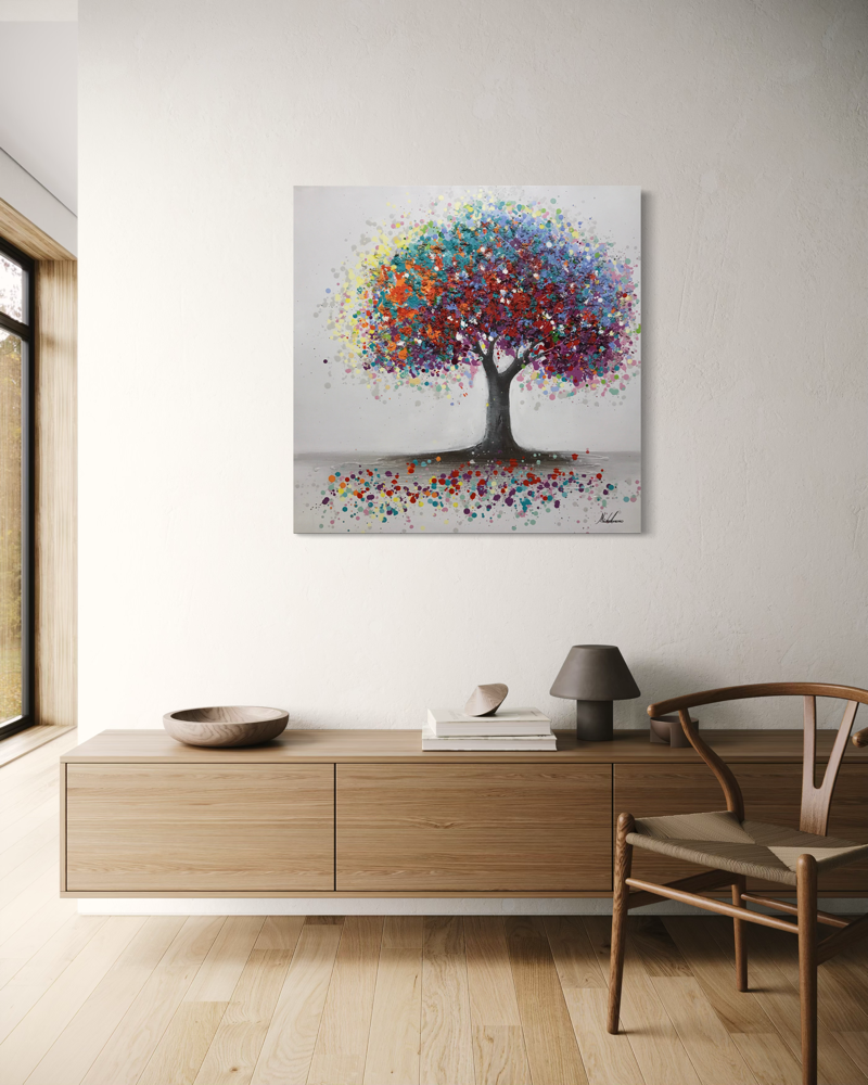 Een schilderij met een kleurrijke boom