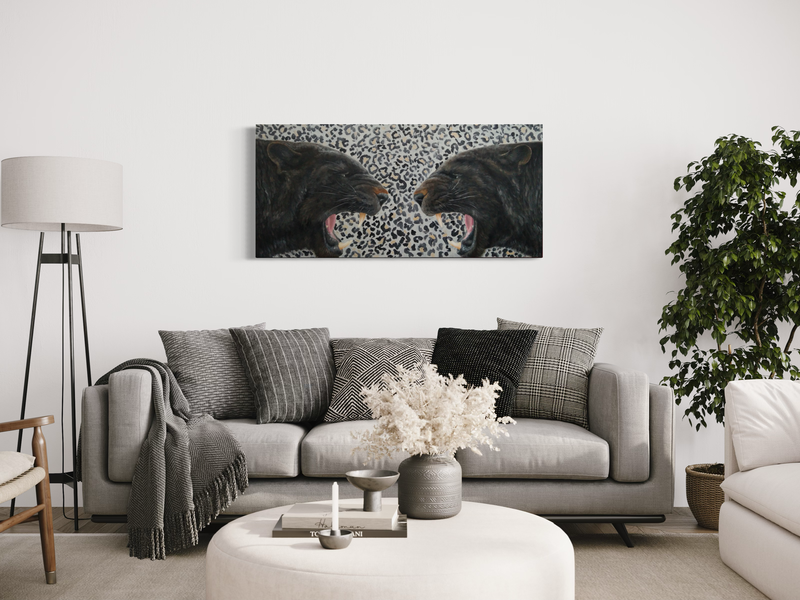 Een schilderij met twee panters