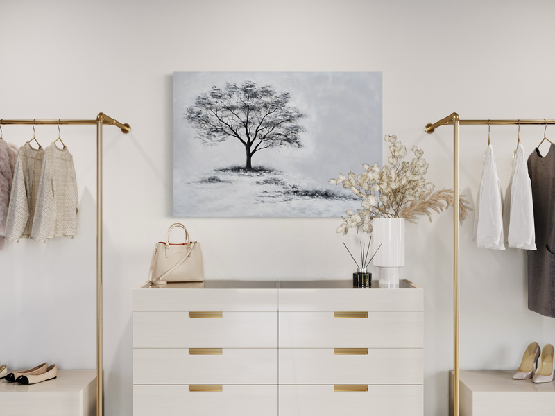 Een schilderij met een boom