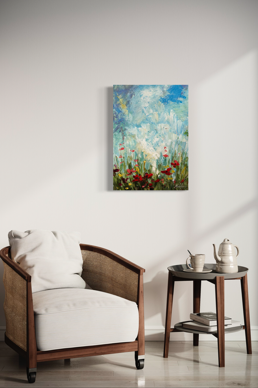 Een schilderij met een bloemenweide