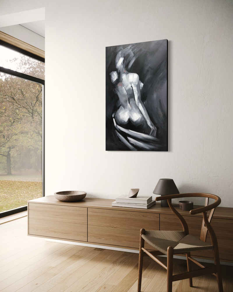 Een schilderij met een naakte vrouw