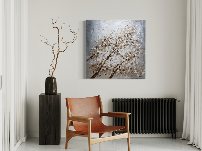 Een schilderij met takken van een boom