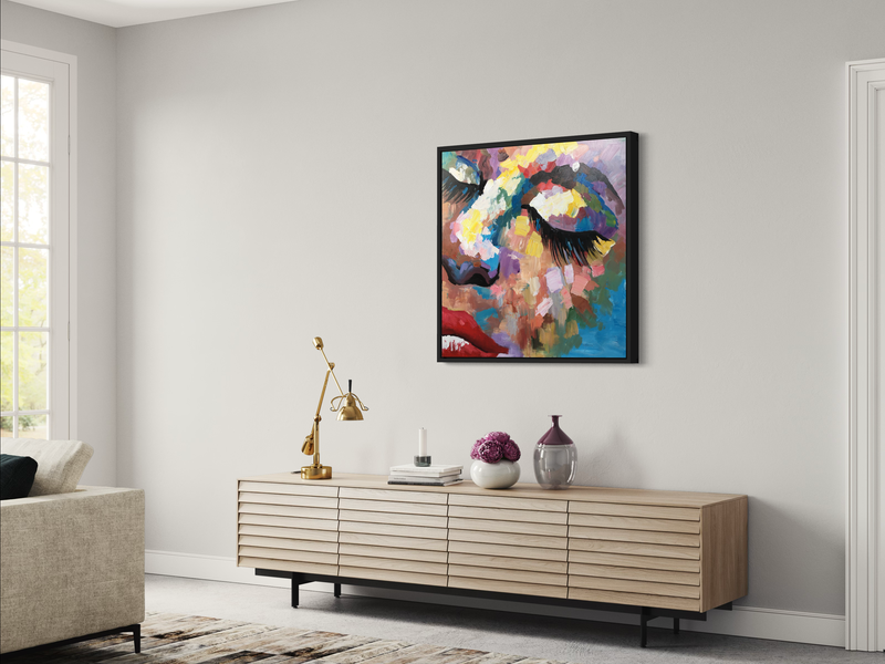 Een schilderij met een gezicht