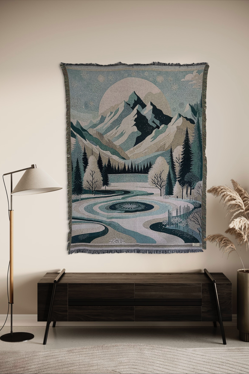 Een wandkleed met een winterlandschap